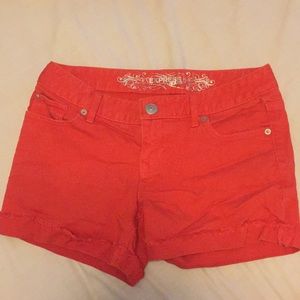 Burnt orange, cutoff shorts